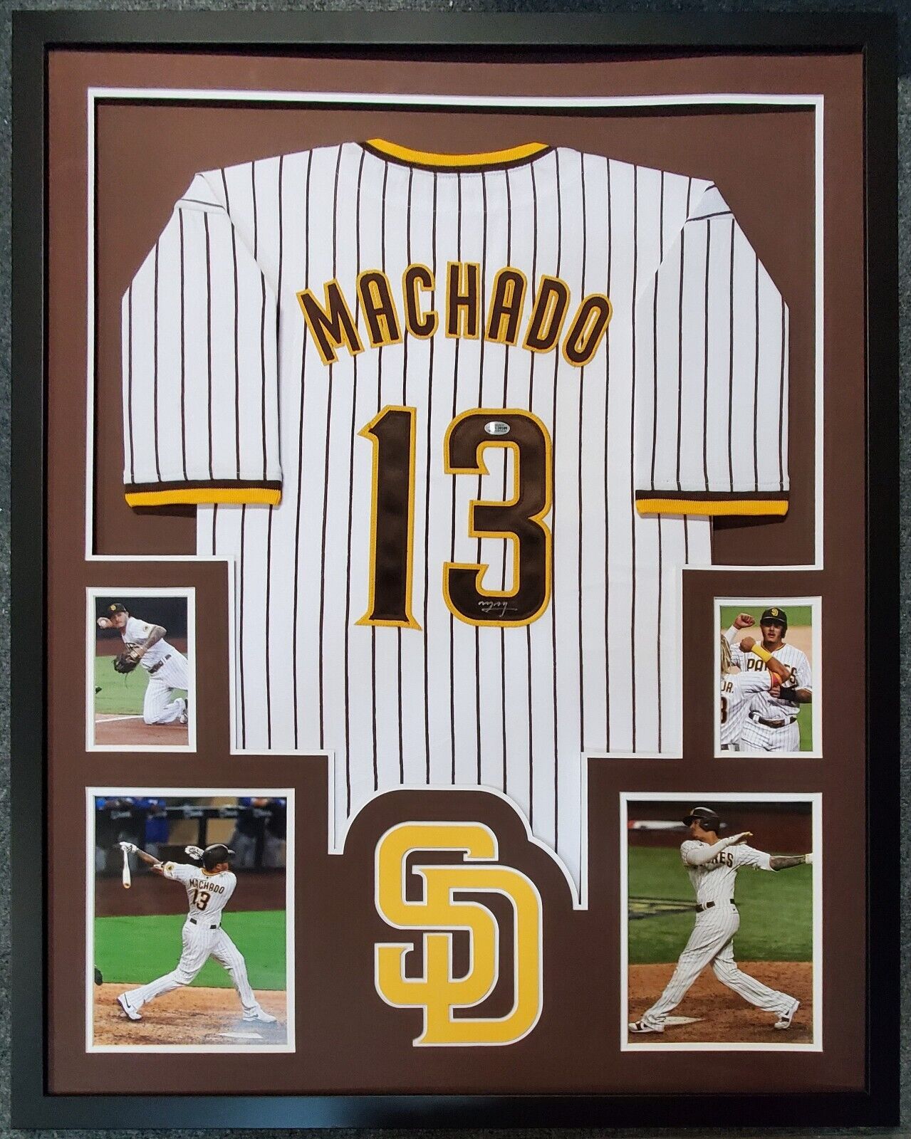 Autographed/Signed Manny Machado San Diego Pinstripe Baseball Jersey  Beckett BAS COA at 's Sports Collectibles Store