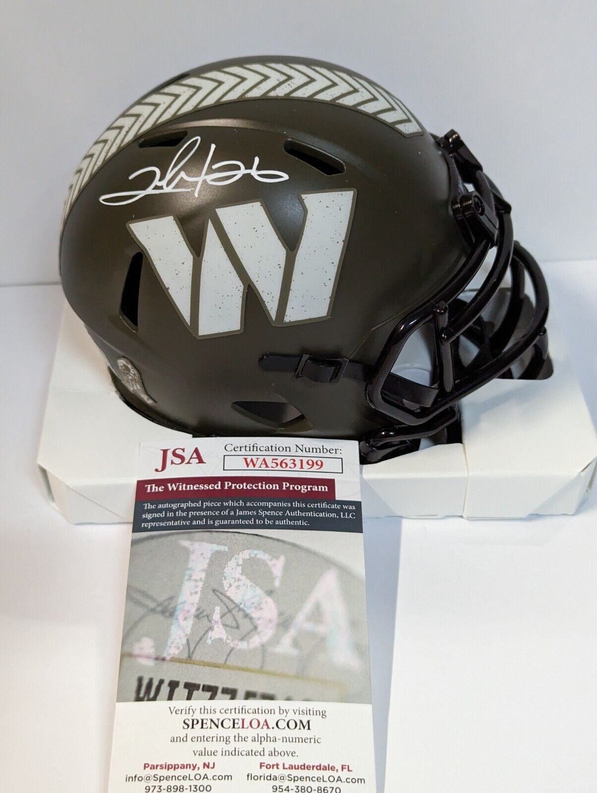 A Salute to Service logo is seen on the helmet of Washington